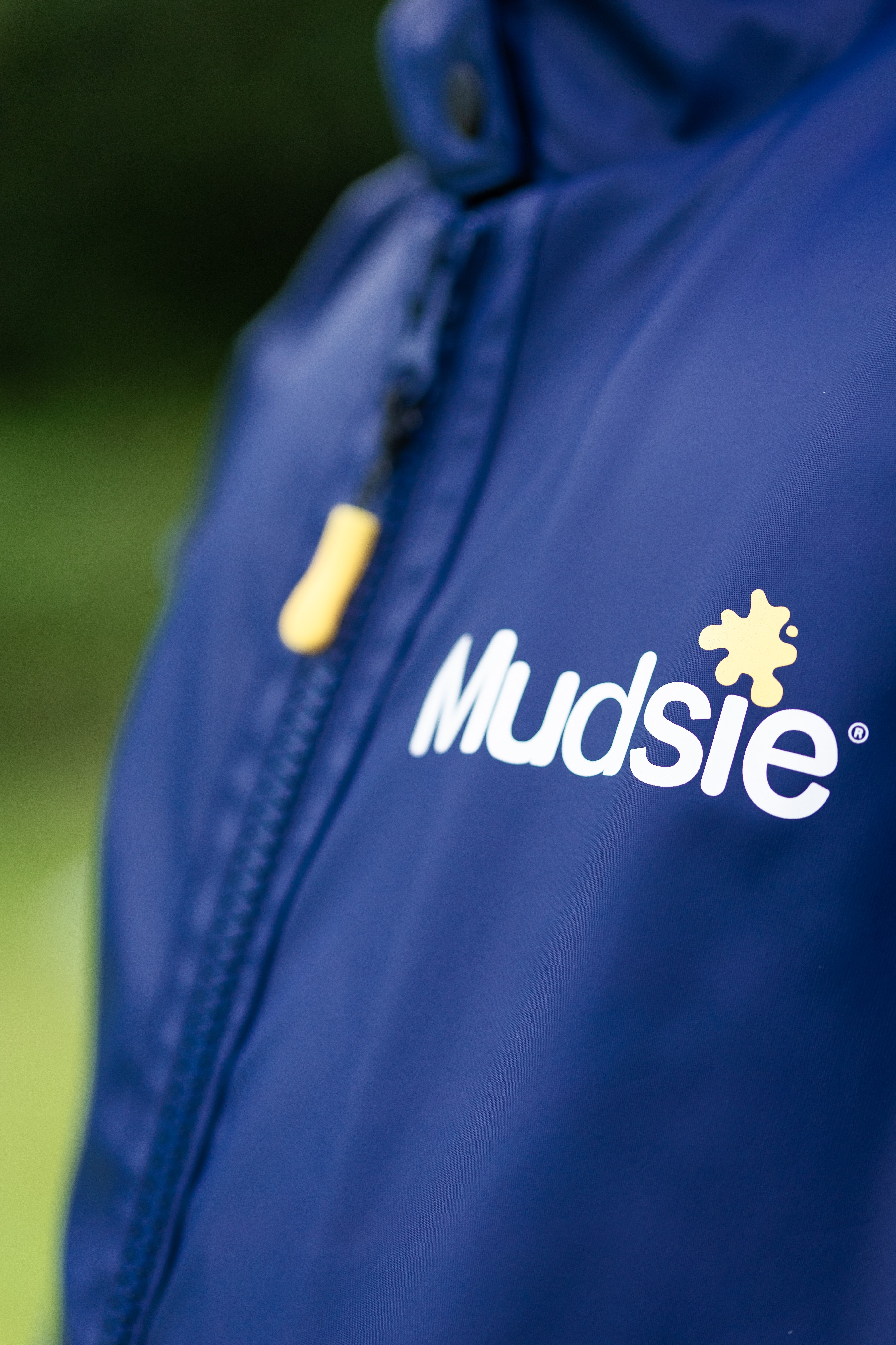 YELLOW LOGO MUDSIE COAT